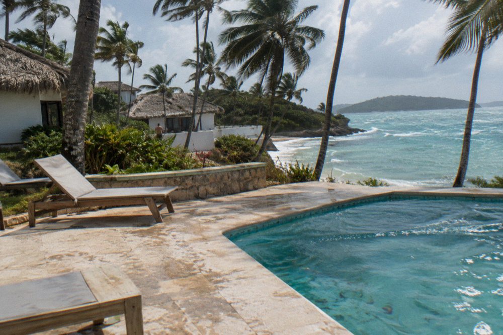 Pool terrace among palms on Cayo Levantado
